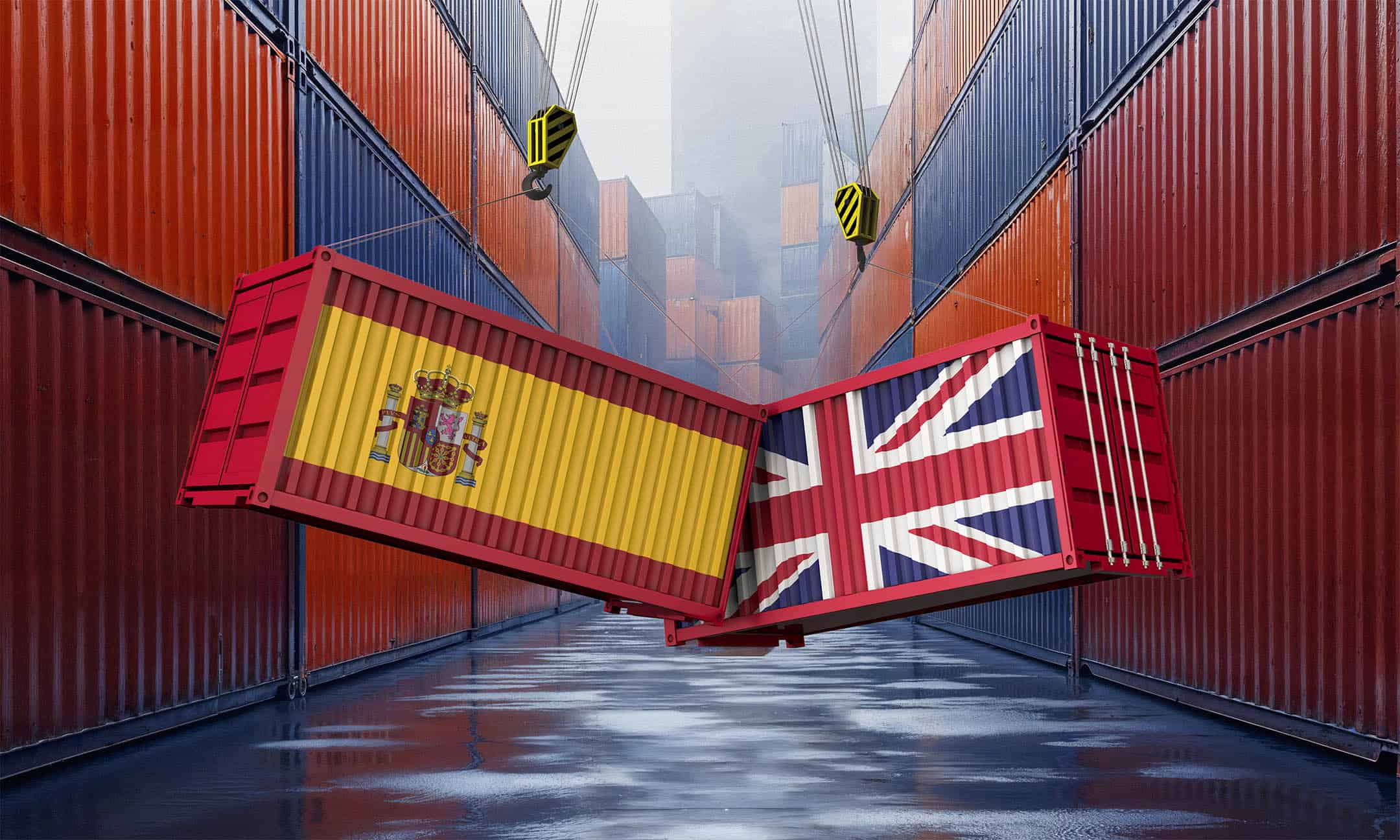 Spain and UK shipping containers next to eachother